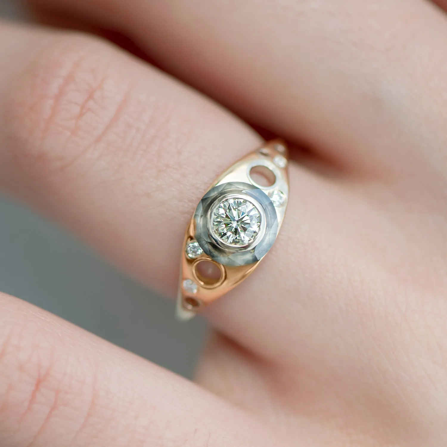 Golden Grommet Ring with a Fancy Green Diamond and Grey Diamond Sphere