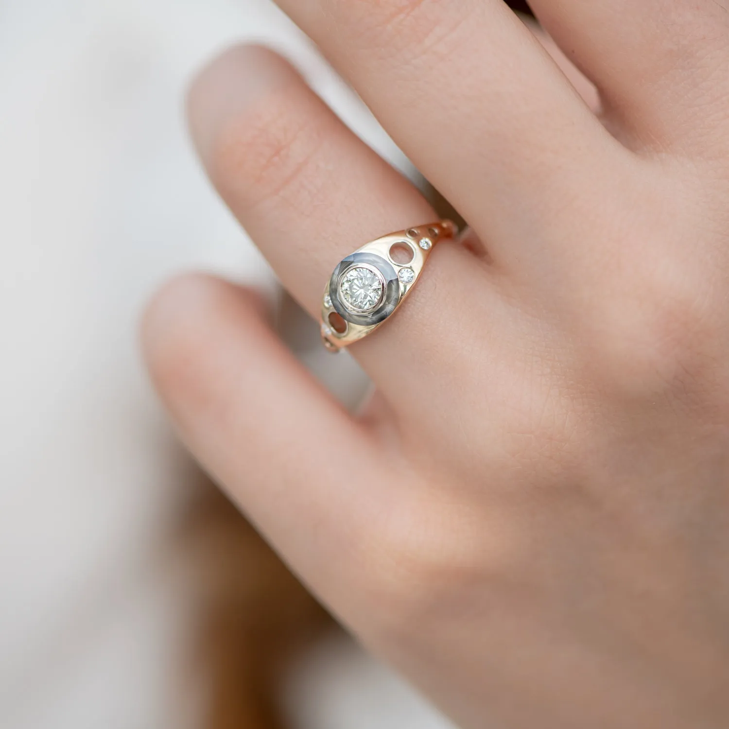 Golden Grommet Ring with a Fancy Green Diamond and Grey Diamond Sphere