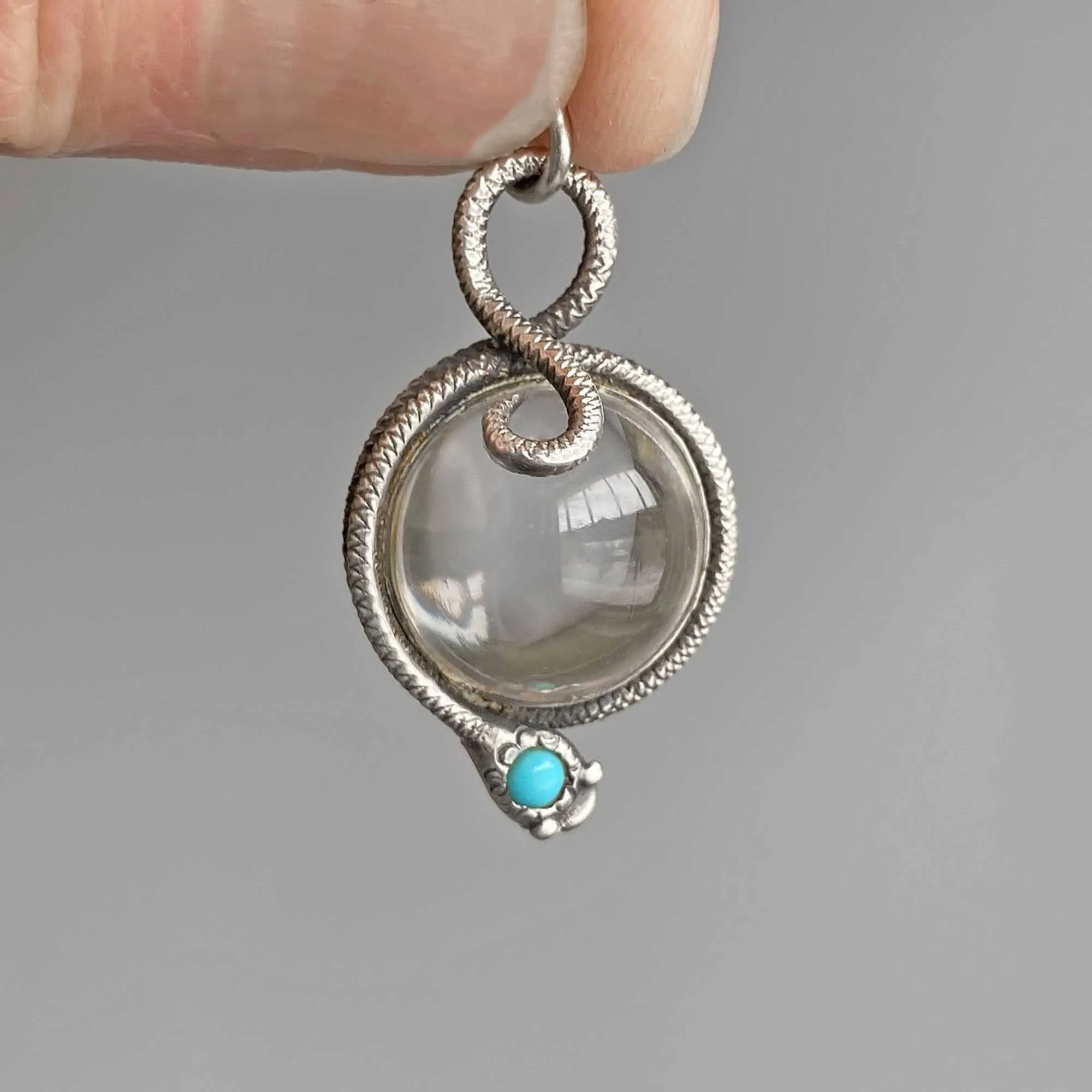 Turquoise Snake Pools of Light Rock Crystal Pendant